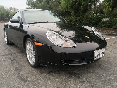 2001 Porsche 911 Carrera 4 Sunroof Coupe. Just 13,425 miles from new